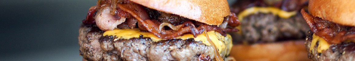 Eating Burger at Astro Burger restaurant in Montebello, CA.